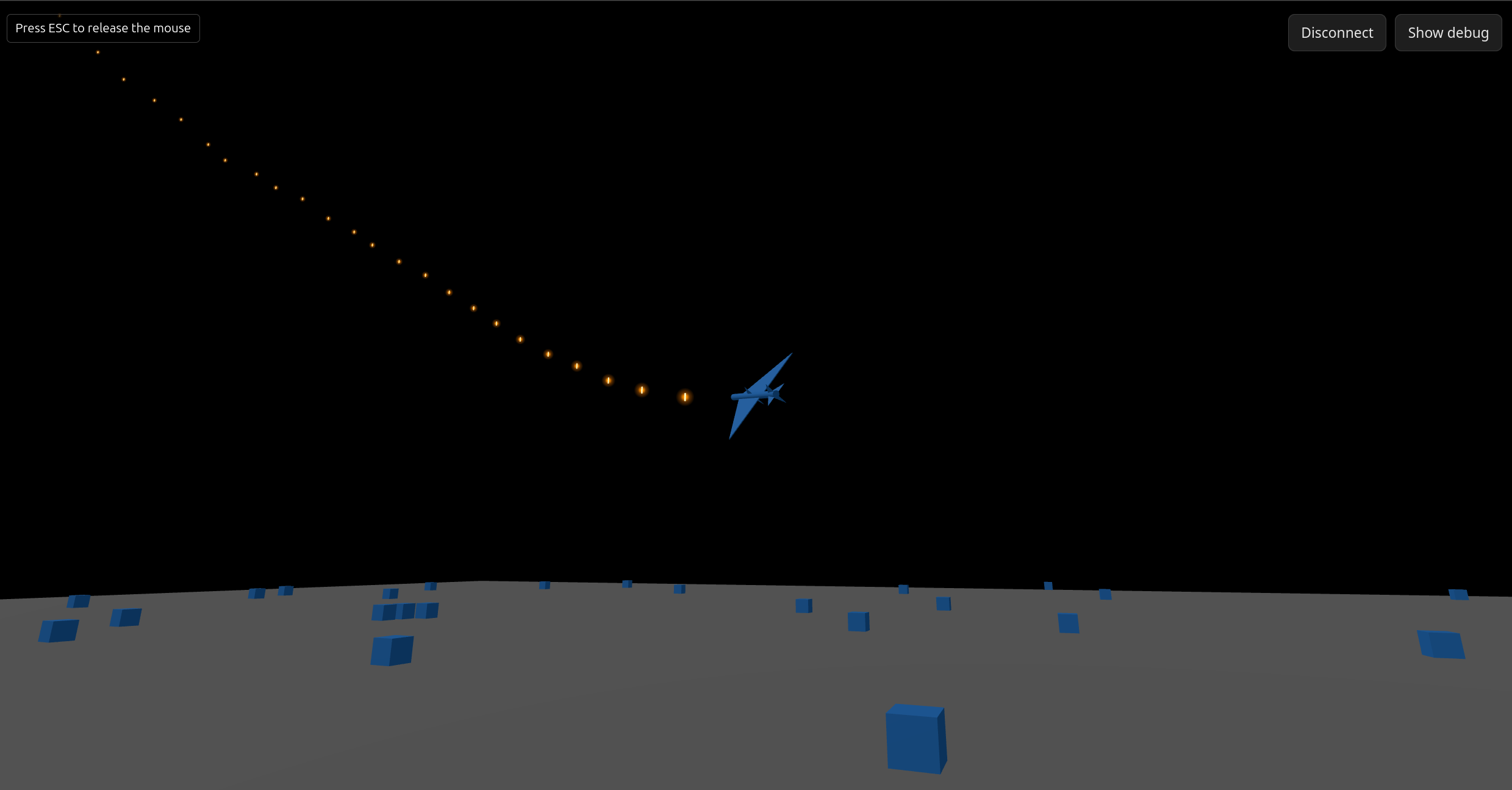 A blue aircraft banking over dark terrain, trailing an orange tracer line during a player-vs-player dogfight.